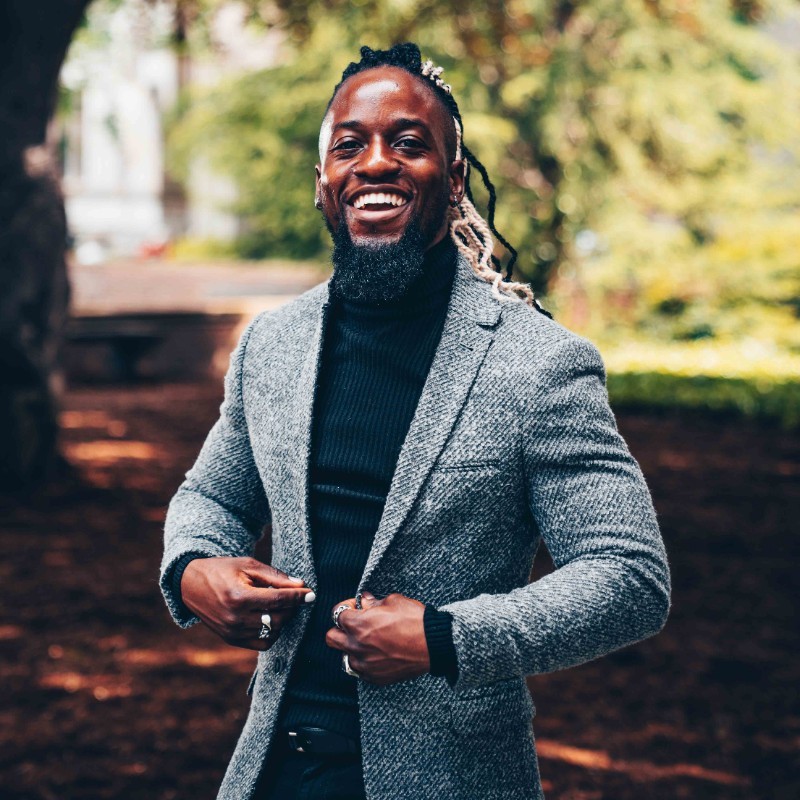 Portrait of Muyinza Kasirye smiling outdoors